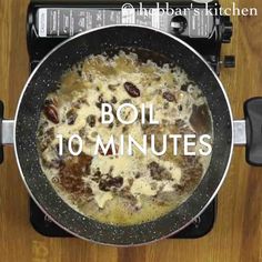 the words boil 10 minutes in front of an image of a pan with food inside