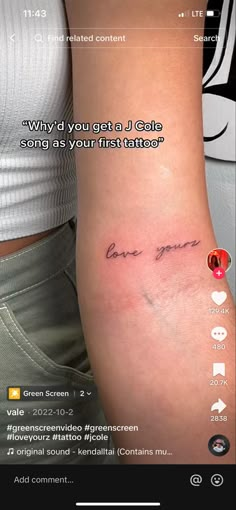 a woman's arm with the words love you on it and an arrow tattoo