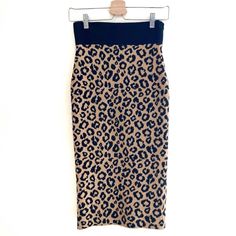 Veronica Beard Bethel Leopard-Print Wool Pencil Skirt Size Xs. Good Condition Gently Owned. Veronica Beard "Bethel" Knit Sweater Skirt In Leopard-Print Wool Blend. Contrast Banded Waist. Straight Silhouette. Mid Length. Vented Back. Wool/Polyester/Nylon. Side Zip, Dry Clean. Imported. ** Visible Marks From The Hanger, See Photos ** - All Items Are Cleaned And Sanitized - Any Imperfections Are Noted In The Listing - Non Smoker /Smoke Free Home - Dog Friendly Home - Fast Shipping, Ships Same Or Ne Knit Sweater Skirt, Wool Pencil Skirt, Veronica Beard, Dog Friendly, Black And Tan, Sweater Skirt, Mid Length, Side Zip, Knit Sweater