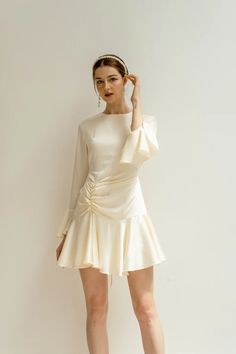 Astrid Satin Mini Dress Short Wedding Dress With Long - Etsy Vietnam Short Wedding Dress Long Sleeves, Long Sleeve Ruffled Mini Dress For Wedding, Feminine Cream Dress With Ruffled Skirt, Short Satin Dress With Sleeves, Short Long Sleeve White Dress, Feminine Ruched Mini Dress For Wedding, Fitted Dress With Ruffle Hem For Wedding, Evening Cream Dress With Ruffles, Chic Fitted Ruffle Dress For Wedding