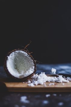 coconuts and sea salt on a cutting board