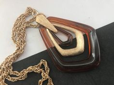 Collectible Avon Signed Tortoiseshell Brown Lucite Large Pendant 1960s 1970s Pendant Necklace - Etsy Moonglow Necklace, Costume Jewelry Sets, Large Pendant Necklace, Vintage Vogue, Vintage Avon, Rhinestone Bracelet, Rhinestone Jewelry, Glass Bead Necklace, Vintage Bracelets