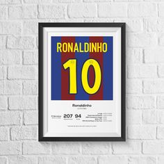 the poster for ronaldino's soccer team is hanging on a white brick wall