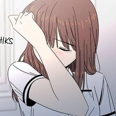 an anime character is holding her head with both hands