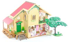 a wooden doll house with furniture and accessories