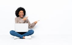 Premium Photo | Young african american woman with a laptop sitting on the floor surprised and pointing side Christian Background Images, Pointing Finger, Pointing Fingers, Fashion Poster Design, Graphic Design Images, Successful Blogger, Hipster Girls, Happy Black, Flyer And Poster Design