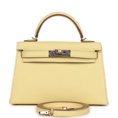 This Special Order Verso Kelly, in the Sellier style, is in Jaune Poussin Epsom leather with permabrass hardware, has tonal stitching, two front straps with front toggle closure, single rolled handle and removable shoulder strap.The interior is lined with Gold leather and has one open pocket on the back wall.Collection: BOrigin: FranceCondition: New and never worn (plastic on hardware)Accompanied by: Hermes box, Hermes dustbag, shoulder strap, shoulder strap dustbag, felt, carebook and ribbonMea Kelly Hermes, Limousine Car, Hermes Kelly Bag, Luxury Lifestyle Women, Hermes Birkin 25, Hermes Box, Burberry Shoes, Kelly Bag, Hermes Birkin 30