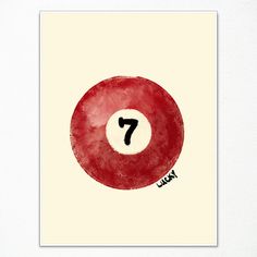 a red pool ball with the number seven painted on it