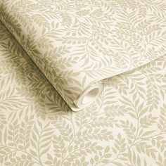 a close up of a wallpaper with leaves on the side and a white background