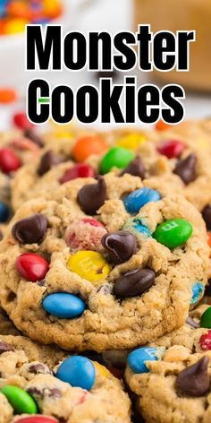 monster cookies with m & m's on top and the words monster cookies above them