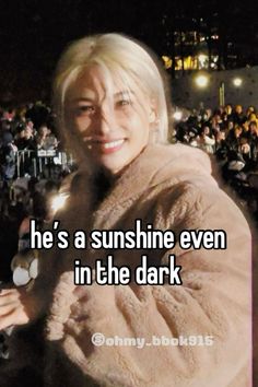 a woman in a fur coat with the words he's a sunshine even in the dark