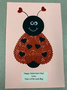 a valentine's day card with a ladybug