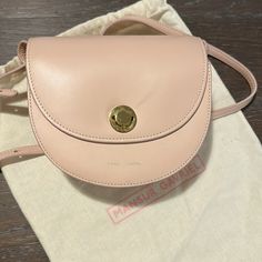 Soft Leather Crossbody In A Light Pink (Rosa) Color With Adjustable Strap Gold Turn-Lock Hardware Spacious Interior With 2 Compartments Includes Dust Bag Great Condition, Minimal Use Mansur Gavriel Bag, Saddle Crossbody Bag, Mansur Gavriel, Leather Crossbody, Soft Leather, Saddle, Light Pink, Crossbody Bag, Adjustable Straps