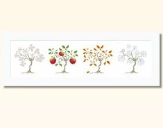 four trees with apples on them and leaves in the branches, all arranged in different colors