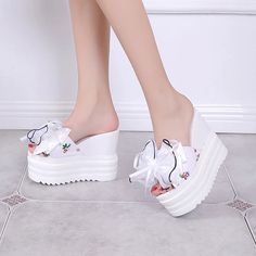 Casual Lace-up Platform Heels, Spring Wedge High Heel Sneakers, Spring High Heel Platform Wedge Sneakers, White Wedge Heel Sneakers For Summer, White Wedge Sneakers For Summer, Summer High Heel Platform Wedge Sneakers, White Synthetic Wedge Heel Platform Slippers, White Platform Wedge Sneakers For Summer, Casual High Heel With Bow