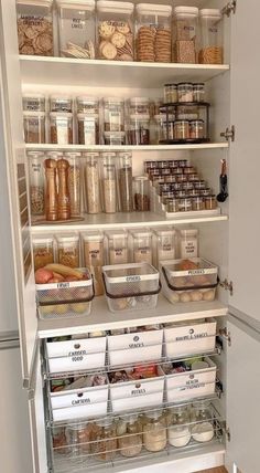 an organized pantry with lots of food in it