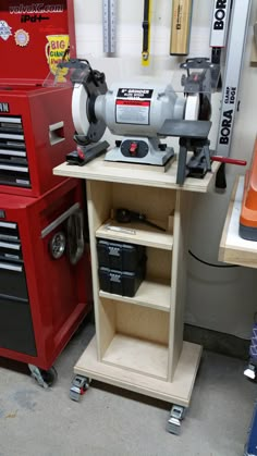 a work bench with tools on it in a garage