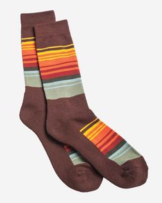 Your favorite National Park Stripes, in a comfortable, midweight cotton blend. Cushioned footbeds for year-round comfort. One customer says "These are the best socks EVER!" Medium: Men's 5-9 / Women's 6-10. Large: Men's 9-12 / Women's 10-13 . Zion: 79% cotton, 10% polyester, 9% nylon, 2% spandex . Olympic: 46% polyester 22% cotton, 21% rayon, 10% nylon, 1% spandex . Great Smokey Mountain: 83% cotton, 10% polyester 6% nylon, 1% spandex . Grand Canyon, Glacier, Crater Lake Yosemite, Rocky Mountain Park Blanket, Recycle Bin, Pendleton Woolen Mills, Striped Blankets, Womens Wetsuit, Crater Lake, Beach Gear, Crew Sock, Men's Socks