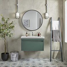 a bathroom with a sink, mirror and ladder in the corner next to a potted plant