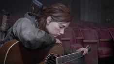 the last of us parte ii is shown with a guitar in front of red seats