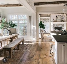 the kitchen is clean and ready to be used as a dining room or breakfast nook