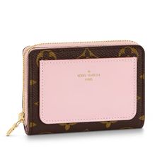 This bifold Louis Vuitton Lou Wallet is composed of Monogram canvas and soft pink leather. It features multiple card slots and pockets. Model: M82378 Color: Brown & Pink Material: Monogram Canvas & Leather Made in: Italy Size: 11.5 x 8.5 x 2.2 cm Condition: NEW with dust bag. Purse Wishlist, Louis Vuitton Wallet Women, Christmas 2025, Bath Body Works Candles, Boston Shearling, Birkenstock Boston Shearling, Dream List, Louis Vuitton Pink, U 2