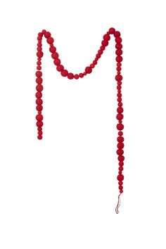 a long red beaded necklace on a white background