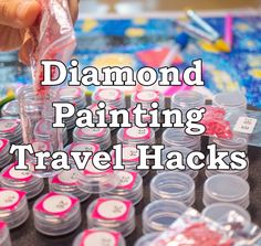 someone is painting travel hacks with pink and white dots on the top of them