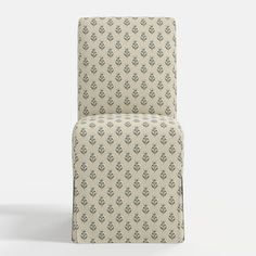 an upholstered chair with a pattern on it