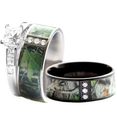 two wedding rings with mossy camo inlays and diamond accents, set on top of each other