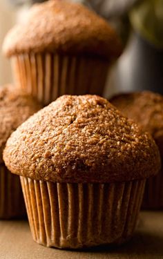 three muffins sitting next to each other on a table