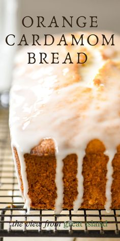 orange cardamom bread with icing on a cooling rack