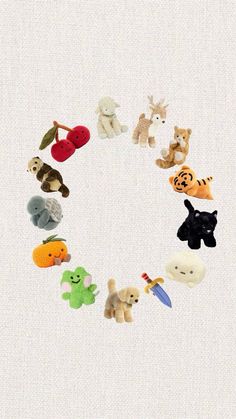 a group of stuffed animals arranged in the shape of a circle