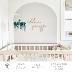 a baby crib with the name'she pong'on it in front of a white wall