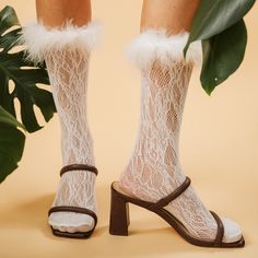 Be bold and stand out with these Destiny Feather Trim Lace Crew Socks! These raiment-ready beauties have the perfect amount of y2k vibes, and can pull up to mid calf or slouch, so you can 'flex' your style in any way you please. Semi-sheer nylon socks patterned in all-over crochet style lace. Hand-sewed feather trim just screams glam. Complete with a stretchy spandex cuff. So whether you're feeling more 'short and sweet' or edgy and elongated, these white aesthetic socks will take you straight t Aesthetic Socks, Wedding Socks, Nylon Socks, Crochet Style, Y2k Vibes, Feather Trim, Crew Sock, Sock Patterns, Calf Socks