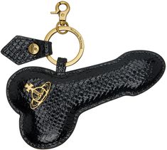 Lobster-clasp keychain in antiqued gold-tone. · Keyring at top · Graphic croc-embossed patent calfskin charm at drop · Logo hardware at face · Logo-engraved antiqued gold-tone hardware · H5.5 x W6 Supplier color: Black Purse Keychain Aesthetic, Men’s Keychain, Novelty Keychains, Charms Keychain, Aesthetic Dump, Cool Keychains, Drop Logo, Cat Brain, Monogram Tattoo