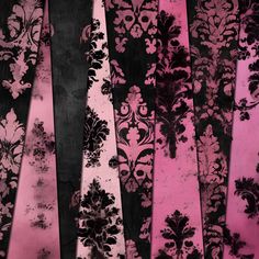 pink, black and white wallpaper with floral designs on it's sides in different colors