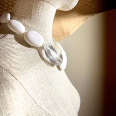 Oval-shaped resin, single-strand clear, and matt white Chic White Round Necklace, Elegant White Glass Necklace, Modern White Adjustable Necklace, White Resin Necklaces, Elegant White Resin Necklace, Formal White Glass Jewelry, Modern White Lucite Jewelry, White Round Resin Necklaces, White Resin Round Necklaces