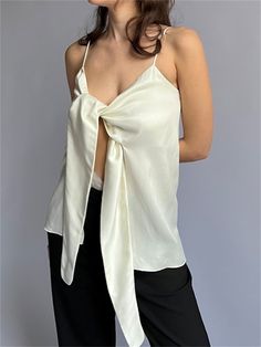 Elegant Spaghetti Strap Tops With Tie Back, Elegant Cami Tops With Tie Straps, Chic Silk Tops With Tie Back, Chic Silk Tie Back Top, Silk Tie-back Top For Evening, Silk Tie Back Top For Evening, Elegant Camisole Top With Tie Back, Elegant Spaghetti Strap Tank Top With Tie Back, Elegant Tie Back Camisole Top