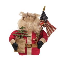 a stuffed santa clause holding an american flag