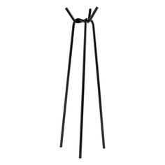 a black metal stand with two legs and one leg bent down to the side, in front of a white background