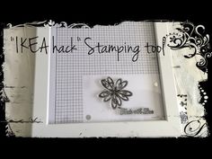 a white frame with a metal butterfly on it and the words kea hack stamping tool