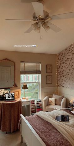 a bed room with a neatly made bed and a ceiling fan in the middle of it