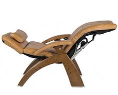 the reclining chair is made out of wood and leather