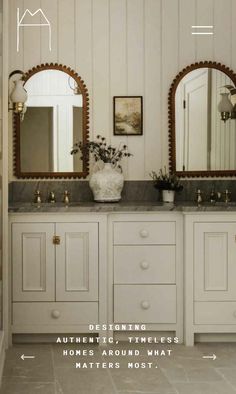 a bathroom with two sinks and three mirrors