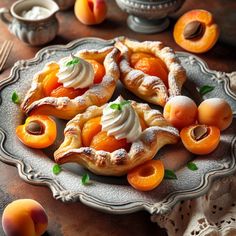 peach pies with whipped cream and fresh peaches on a plate, ready to be eaten