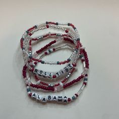 Set Of Five Handcrafted Beaded Bracelets Celebrating College Spirit! Each Bracelet Showcases Vibrant School Colors And Is Personalized With Your College's Name. Perfect Accessory To Flaunt Your School Pride Or A Thoughtful Gift. Embrace Your College Journey With These Stylish And Meaningful Bracelets! Alabama Bracelet, Casual White Beaded Bracelets With Faceted Beads, Family Christmas Diy, College Names, University Of Alabama, School Colors, Womens Jewelry Bracelets, Handcrafted Jewelry, Thoughtful Gifts