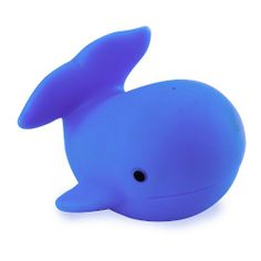 a blue whale toy sitting on top of a white surface