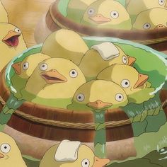 a bunch of yellow ducks in a basket