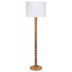 a wooden floor lamp with a white lampshade on the base and a light shade